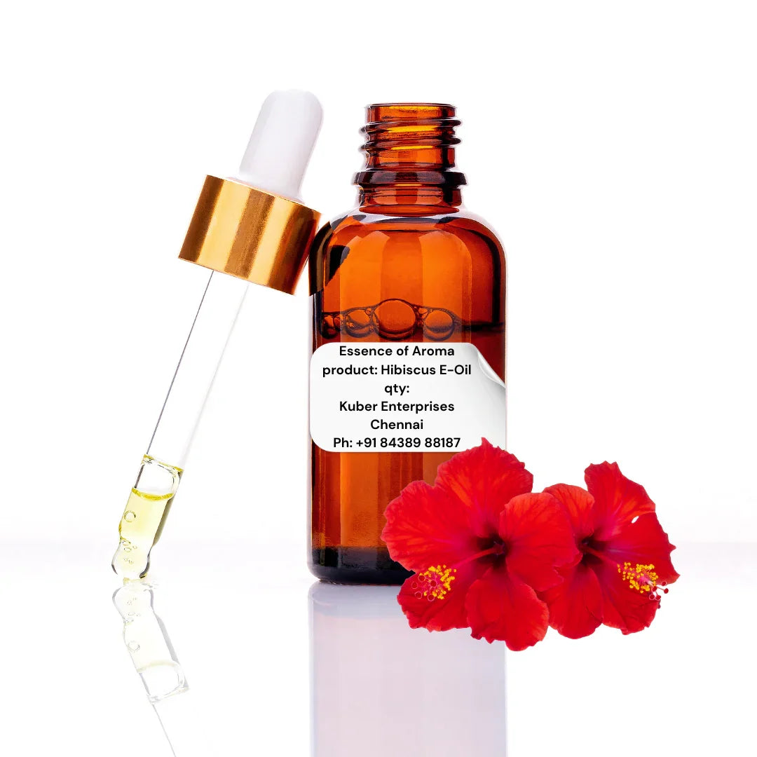 hibiscus essential oil bottle with dropper and red flowers on a white background