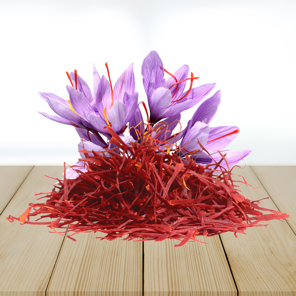 Purple saffron flowers with red stamens on a wooden surface