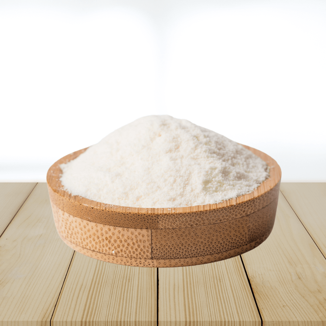 Wooden bowl filled with kojic acid on a wooden surface