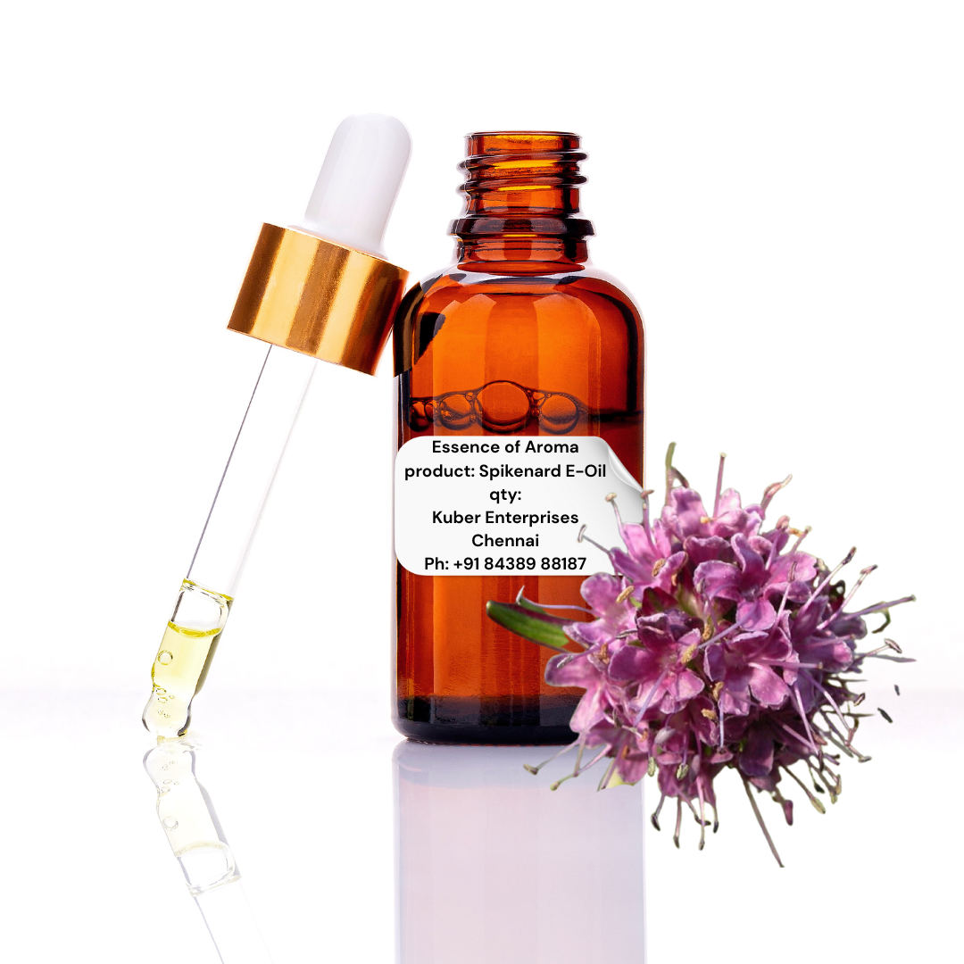 Spikenard essential oil bottle with dropper and purple flower on a white background