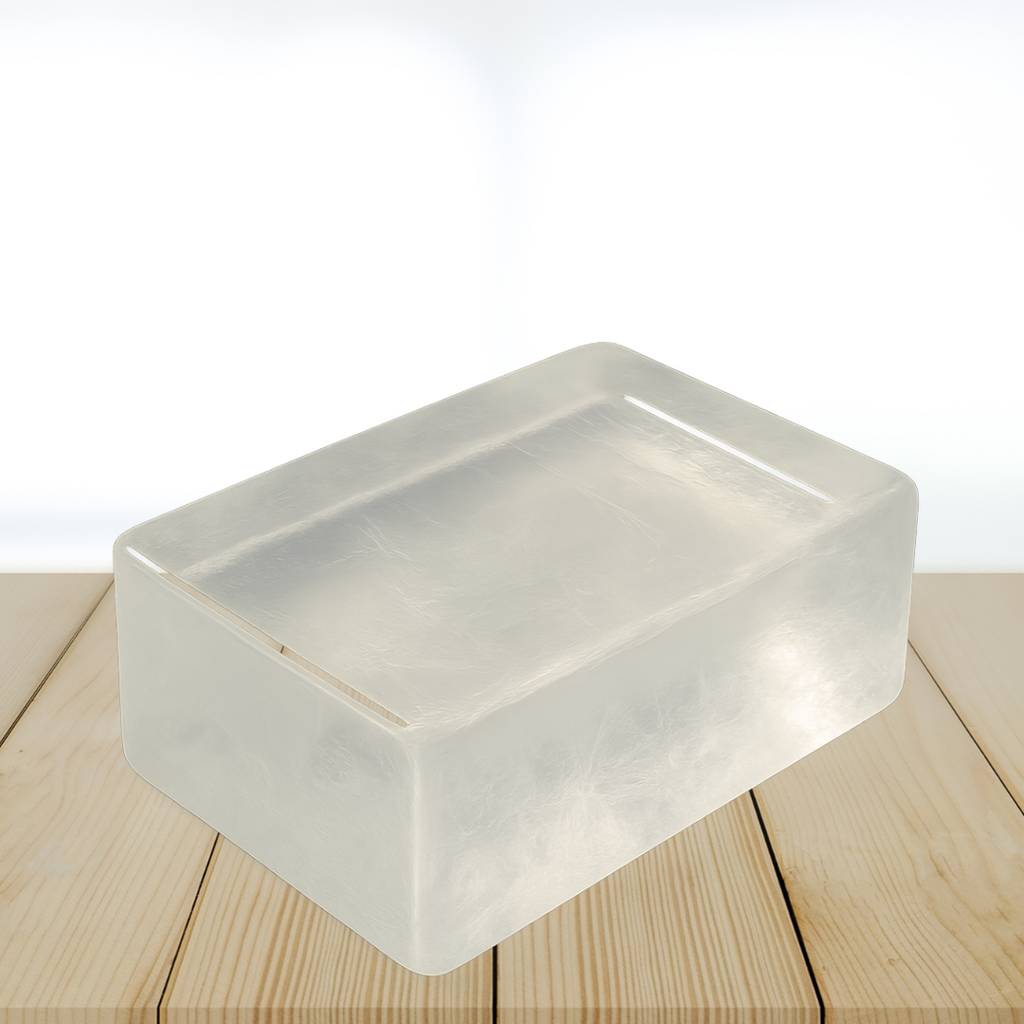 glycerin soap base block on a wooden surface with a white background