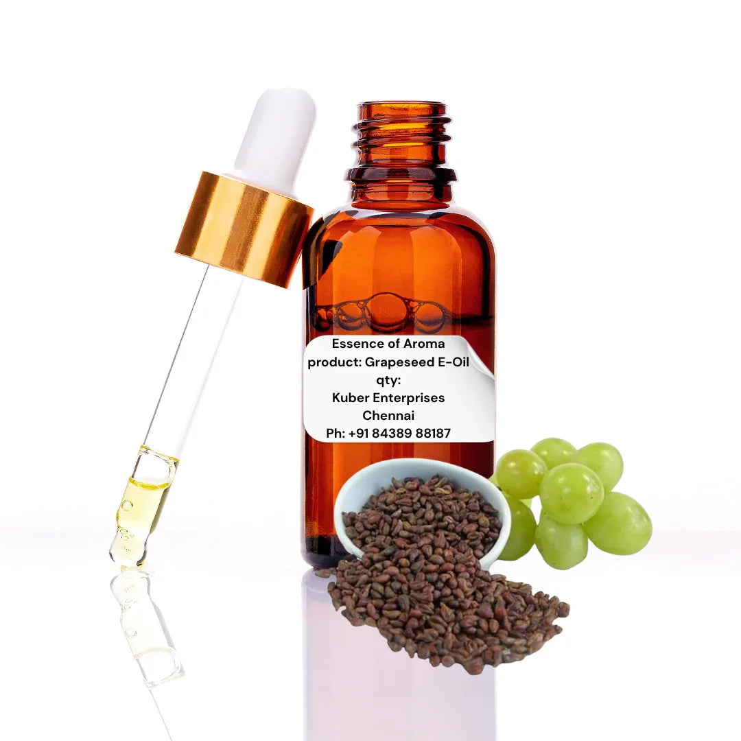 Grapeseed oil bottle with dropper, seeds, and grapes on a white background